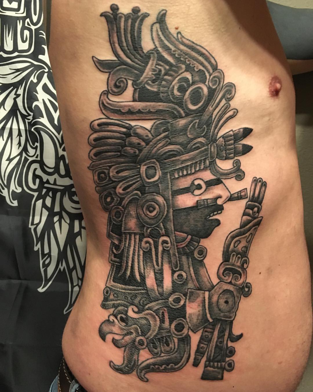 Detailed black and grey tattoo healing cleanly